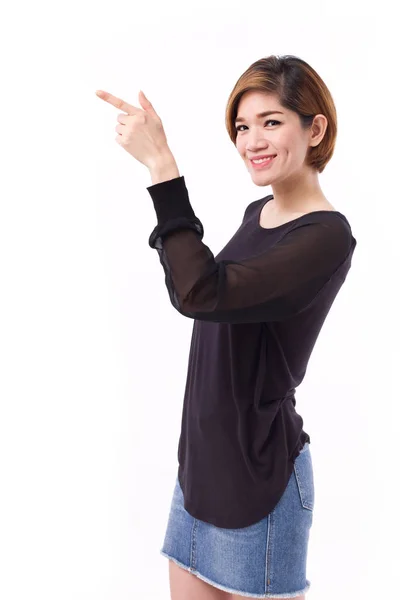 Happy woman pointing hand and finger up to blank space, studio isolated — Stock Photo, Image