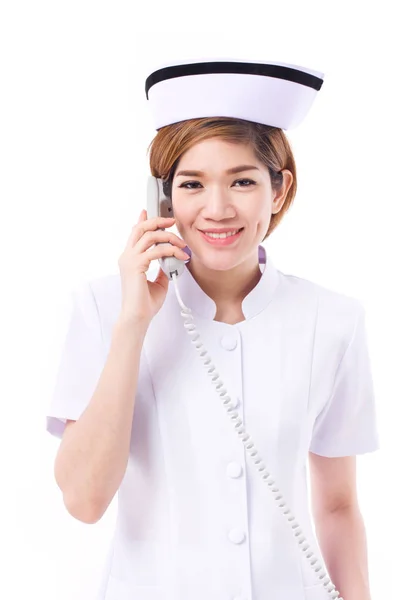Enfermeira no telefone, estúdio isolado — Fotografia de Stock