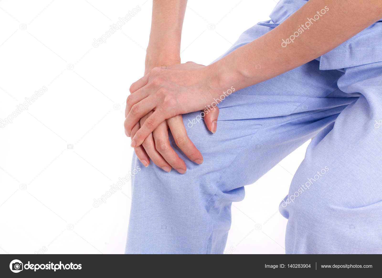 Woman suffering from knee joint pain, arthritis, gout Stock Photo by