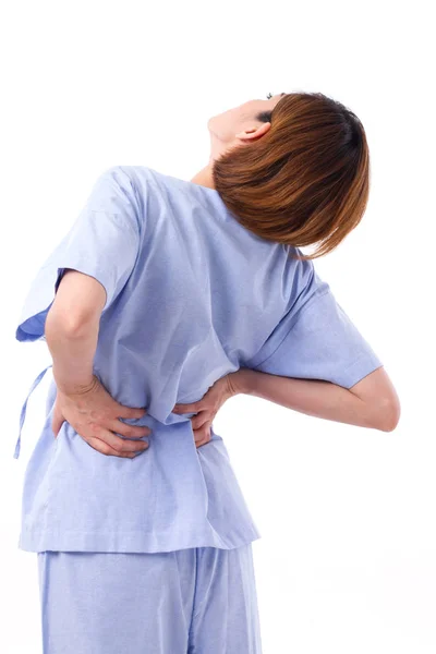 Mujer que sufre de dolor de espalda, columna vertebral o lesión muscular espinal — Foto de Stock