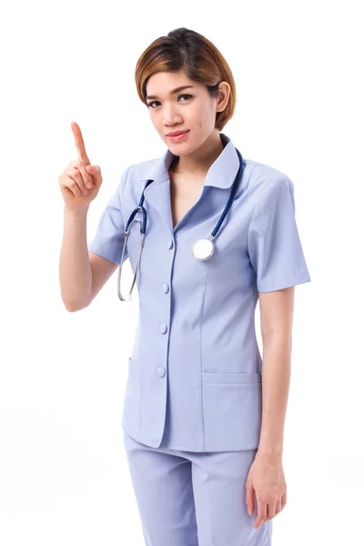 Confident nurse pointing one finger up to blank space — Stock Photo, Image