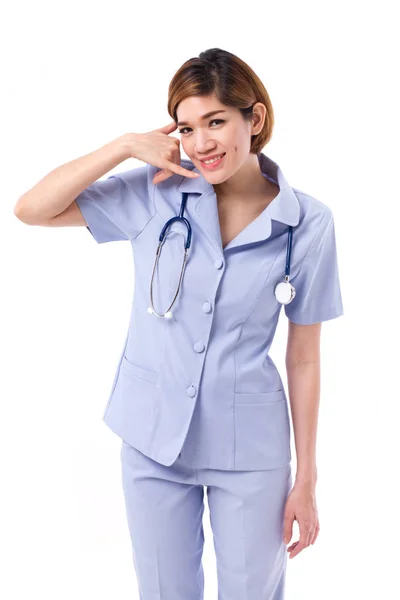 Female nurse with contact or information hand gesture — Stock Photo, Image