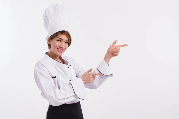 Feminino ásia chef duplo apontando para o lado — Fotografia de Stock