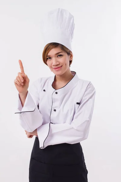 Feminino ásia chef apontando até um dedo gesto — Fotografia de Stock