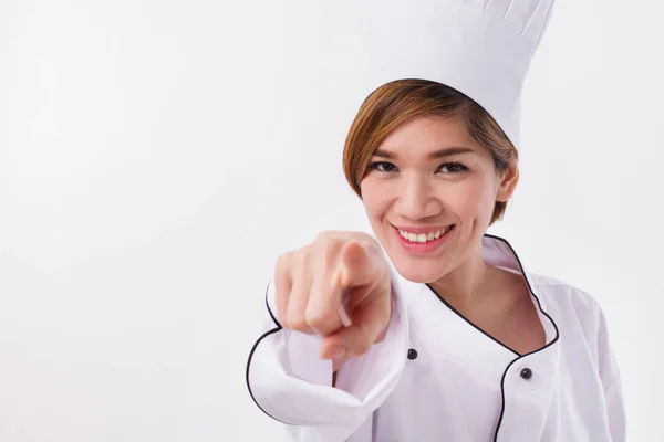 Щаслива жінка азіатська шеф-кухарка вказує на вас — стокове фото