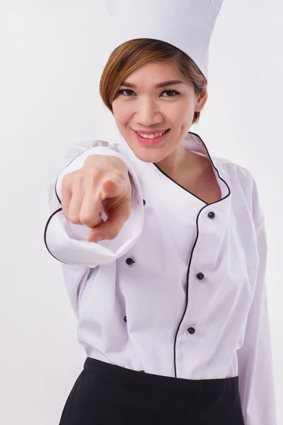 Feliz feminino asiático chef apontando para você — Fotografia de Stock