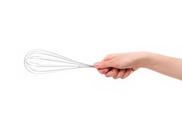 Baker or chef hand holding whisker, kitchen utensil — Stock Photo, Image