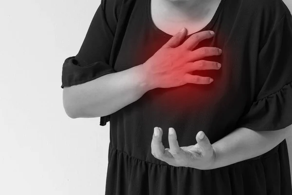 Sick middle age woman suffering from acute heart attack emergency — Stock Photo, Image