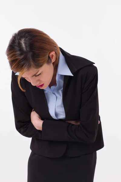 Mujer de negocios que sufre de dolor de estómago, reflujo ácido, gastritis — Foto de Stock