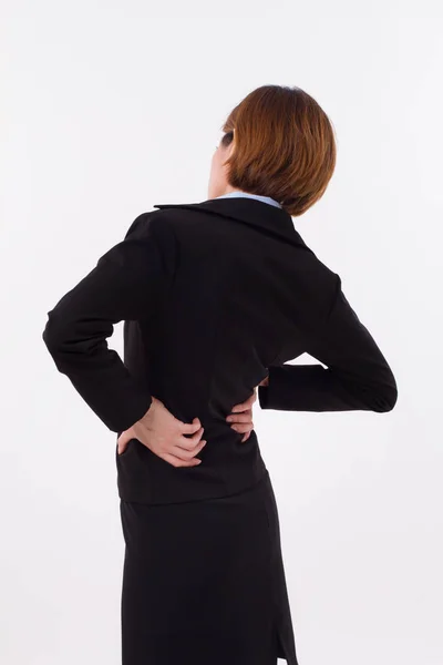 Woman suffering from back pain, injury, office syndrome — Stock Photo, Image