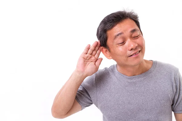 Asiatischer alter mann hört zu, mit ablehnender geste — Stockfoto