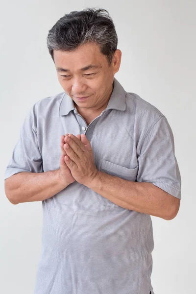 Old man greeting asian thai style — Stock Photo, Image