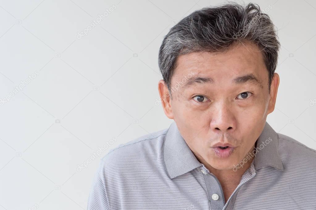 exited, confident, happy old senior or middle age asian man face