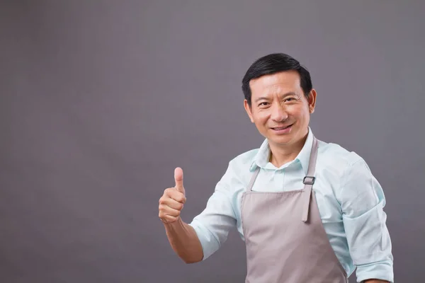 Confident shopkeeper giving thumb up, concept of successful small business owner — Stock Photo, Image