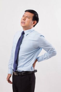 business man suffering from back pain, spinal injury clipart