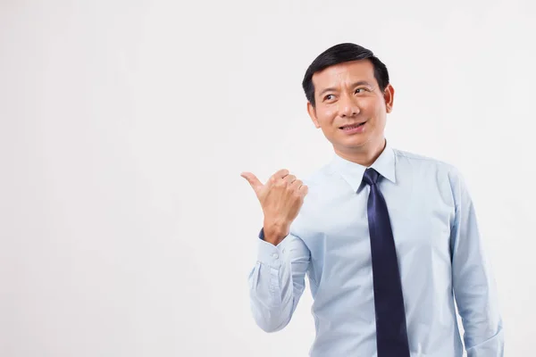 Businessman pointing up thumb up to his side — Stock Photo, Image
