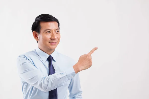 Businessman pointing his finger away — Stock Photo, Image