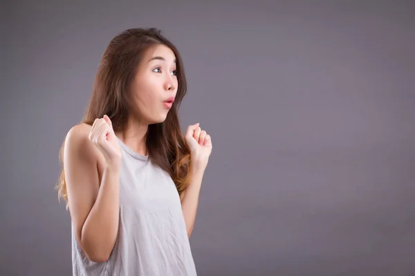 exited woman looking up studio isolated portrait