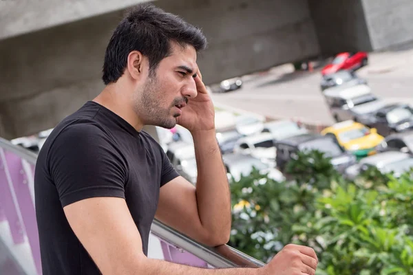 upset asian man got stuck in heavy traffic jam