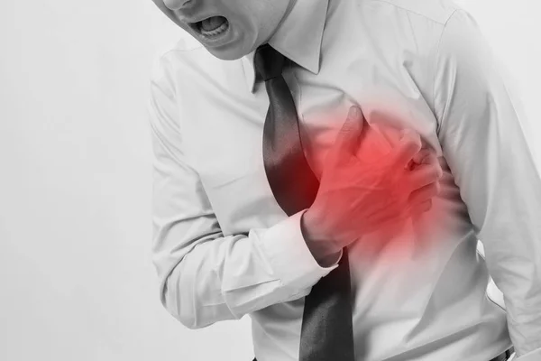 Sick man with heart attack — Stock Photo, Image