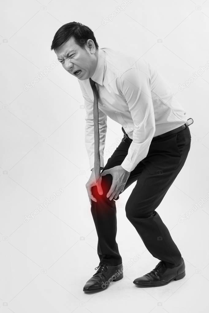 man suffering from knee joint pain