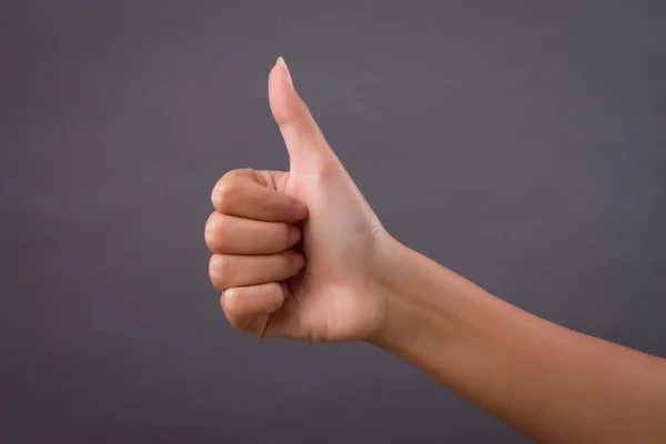 hand showing thumb up, like, good, approval, acceptance, okay, ok, positive gesture