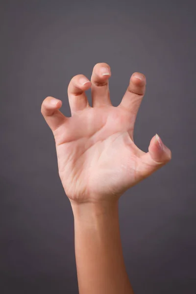 Angry, aggressive hand scratching claw — Stock Photo, Image