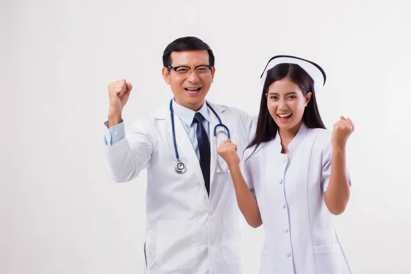 Spokojený úsměv radostné lékař a zdravotní sestra, úspěšné lékařský tým — Stock fotografie