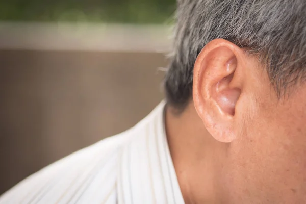 senior old man listening, hearing problem or receiving information