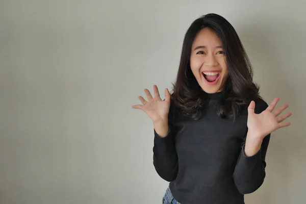 Happy excited asian woman laughing — Stock Photo, Image