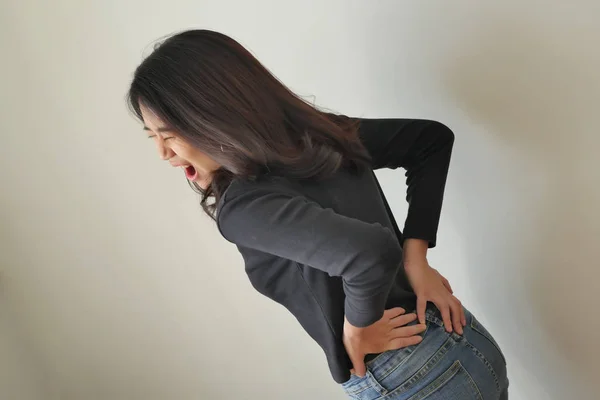 Woman suffering from back pain, girl with backbone or spinal muscle injury — Stock Photo, Image