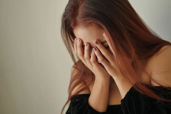 Stressed woman doing facepalm gesture — Stock Photo, Image
