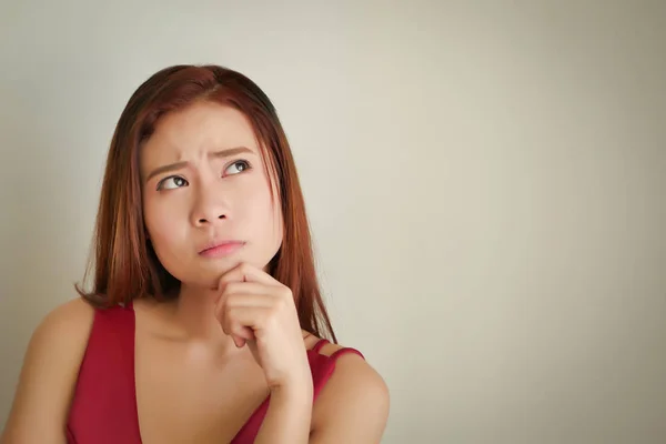 Sad worried stressed woman looking up to blank spacd — Stock Photo, Image