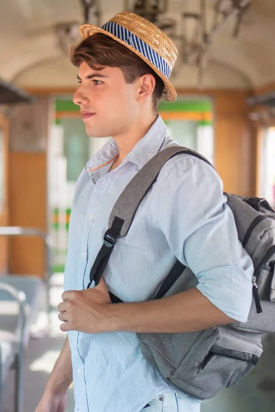 portrait of man backpack traveler with hat; concept of traveling, tourism, vacation trip, backpack travel, solo travel
