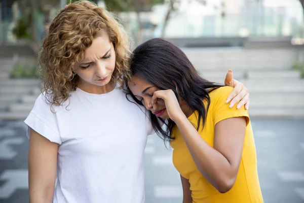 woman good friend giving encouragement to her friend with ethnicity diversity, concept of best friend, good friend, race or ethnicity tolerance, friend cheering up, hope in humanity, love and peace