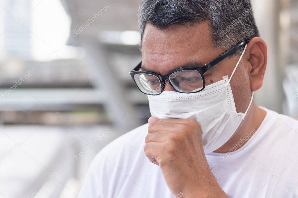 allergic sick old man coughing with sore throat; concept of man with allergy, phlegm, sore throat or throat inflammation, influenza, flu, cold, sickness, health care concept