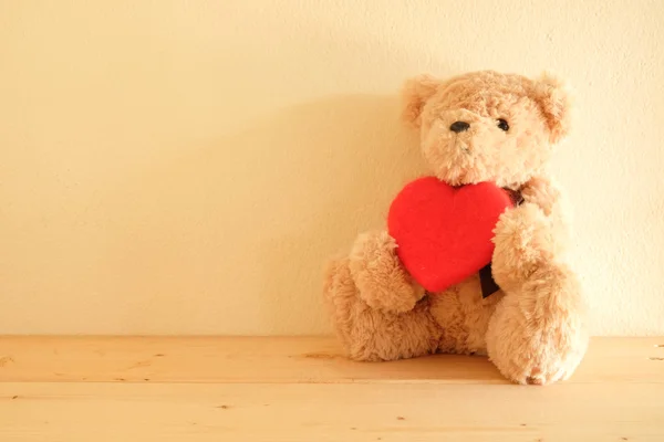 Teddy Bear toy alone on wooden table — Stock Photo, Image