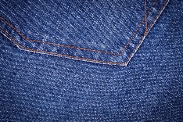 Textuur van blauwe jeans achtergrond — Stockfoto