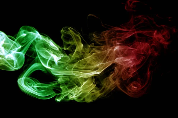 Abstracto fondo humo curvas y onda reggae colores verde, y — Foto de Stock