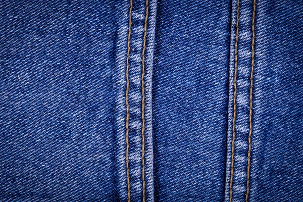 Textuur van blauwe jeans achtergrond — Stockfoto