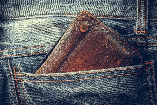 Portafoglio e jeans con effetto filtro retrò stile vintage — Foto Stock