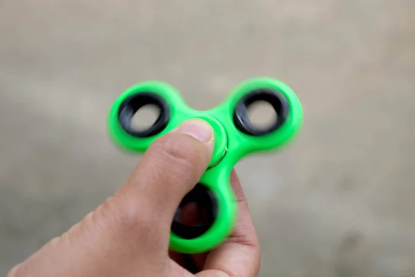 Fidget Spinner speed Spin in hands — Stock Photo, Image