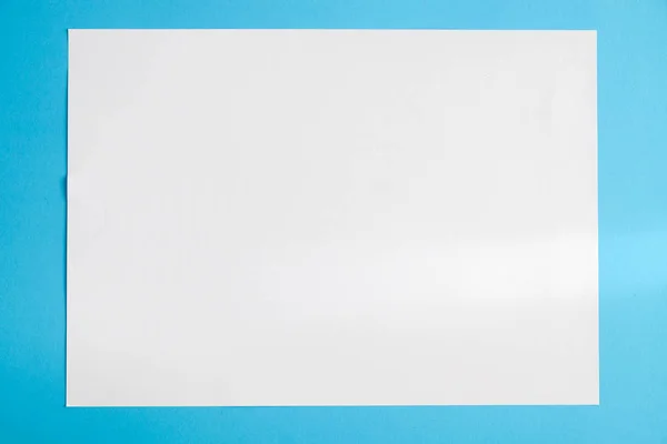 White torn paper with blue background, ready for design — Stock Photo, Image