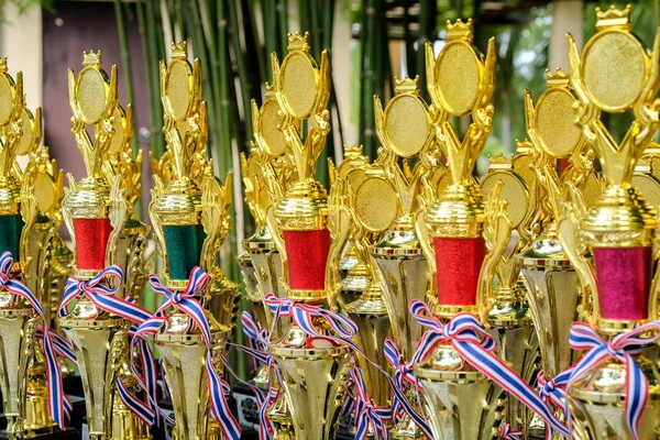 Skupina zlaté trofeje — Stock fotografie