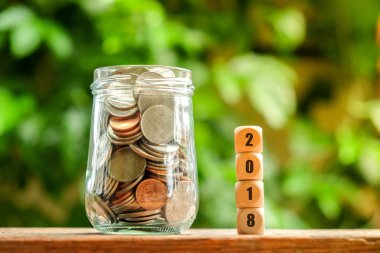 yatırım için para tasarrufu 2018 yeni yıl m filtre etkisi retro vintage tarzı ile Kaydet ipotek kavramı ile para sikke