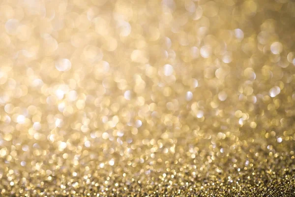 Gold abstrakt Weihnachten funkelte hell Hintergrund mit Bokeh de — Stockfoto