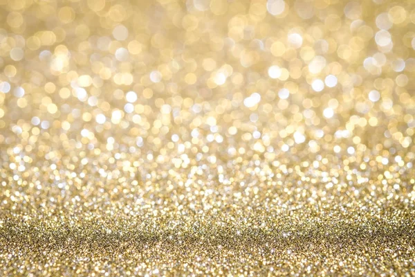 Gold Abstract Christmas twinkled bright background with bokeh de — Stock Photo, Image