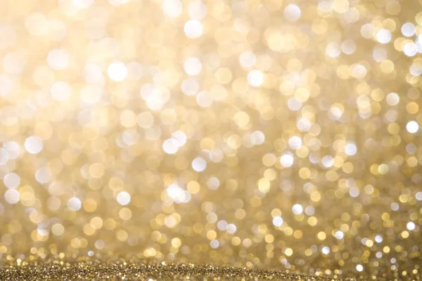 Ouro abstrato Natal cintilou fundo brilhante com bokeh de — Fotografia de Stock
