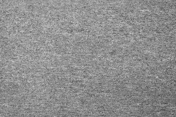 Gros plan de fond de texture de tapis gris monochrome d'en haut — Photo