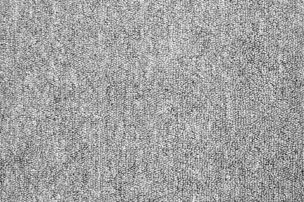 Close up of monochrome grey carpet texture background from above — Stock Photo, Image